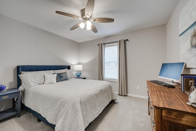 bedroom with baseboards, carpet, and a ceiling fan