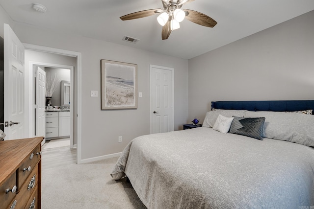 bedroom with visible vents, light colored carpet, a ceiling fan, and baseboards