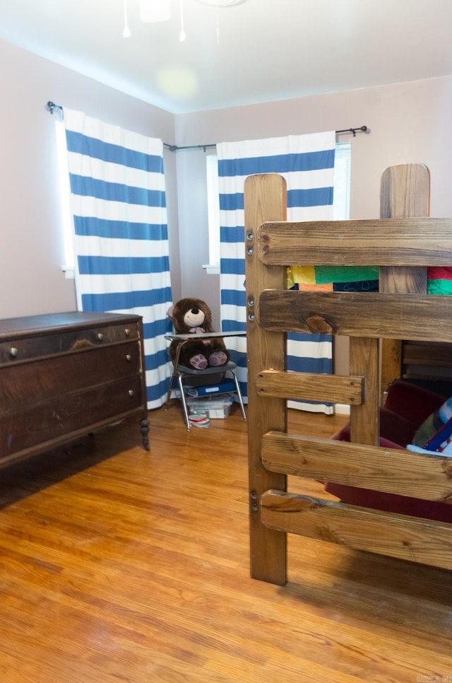 bedroom featuring wood finished floors