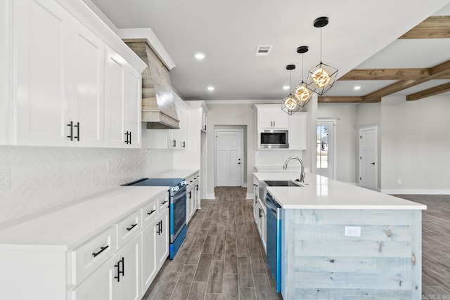 kitchen with visible vents, custom range hood, stainless steel appliances, light wood-style floors, and decorative backsplash