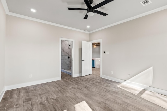 unfurnished bedroom featuring visible vents, ornamental molding, wood finished floors, recessed lighting, and baseboards