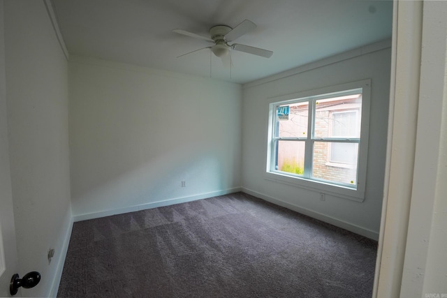 unfurnished room featuring baseboards, carpet, and a ceiling fan