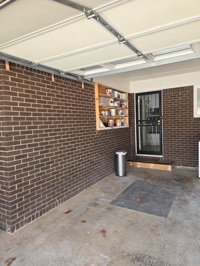 property entrance with brick siding