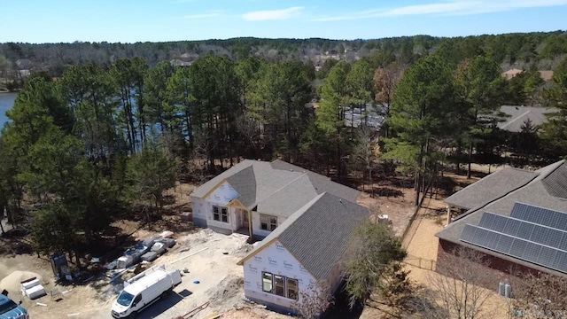 bird's eye view with a forest view