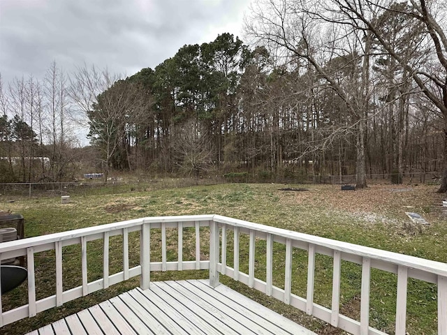 wooden deck with a yard