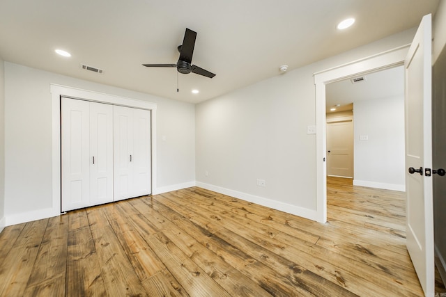 unfurnished bedroom with recessed lighting, visible vents, and light wood finished floors