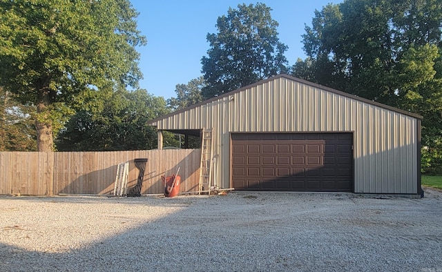 detached garage with fence