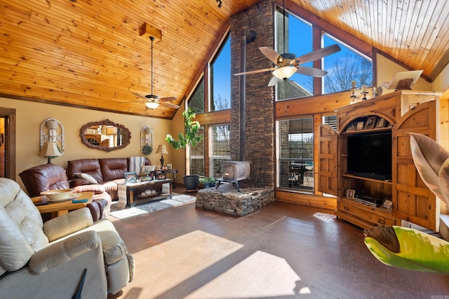 living area with high vaulted ceiling, concrete floors, wood ceiling, ceiling fan, and a wood stove