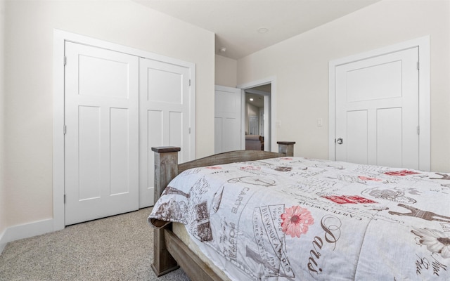 bedroom with a closet and carpet