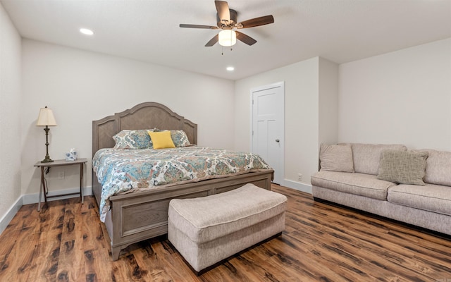 bedroom featuring recessed lighting, baseboards, wood finished floors, and a ceiling fan