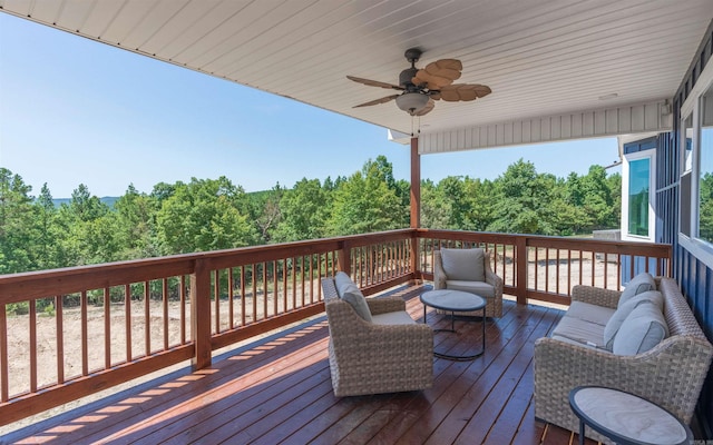 wooden deck with ceiling fan