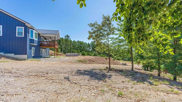 view of yard featuring a ceiling fan