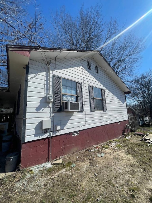 613 E Maple St, Benton, AR 72015 - view of home's exterior featuring crawl space and cooling unit