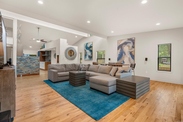 living room with recessed lighting, vaulted ceiling with beams, light wood-type flooring, and ceiling fan