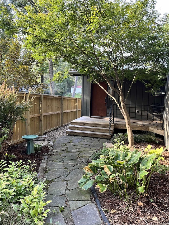 view of patio / terrace with entry steps and fence