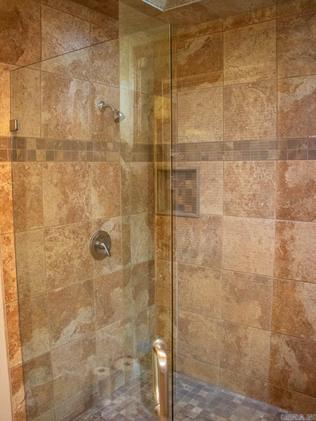 bathroom with a stall shower