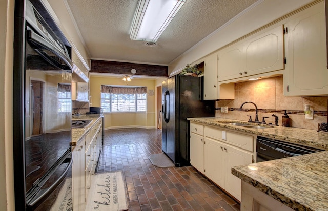 106 Pine Forest Ln, Fordyce, AR 71742 - kitchen with black appliances, a sink, tasteful backsplash, a textured ceiling, and brick floor