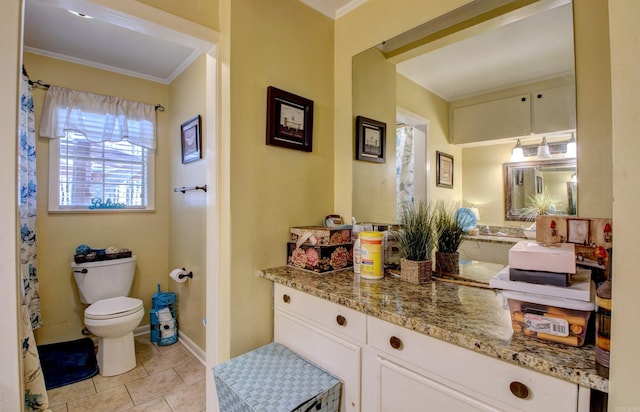 106 Pine Forest Ln, Fordyce, AR 71742 - bathroom featuring tile patterned flooring, baseboards, toilet, ornamental molding, and vanity