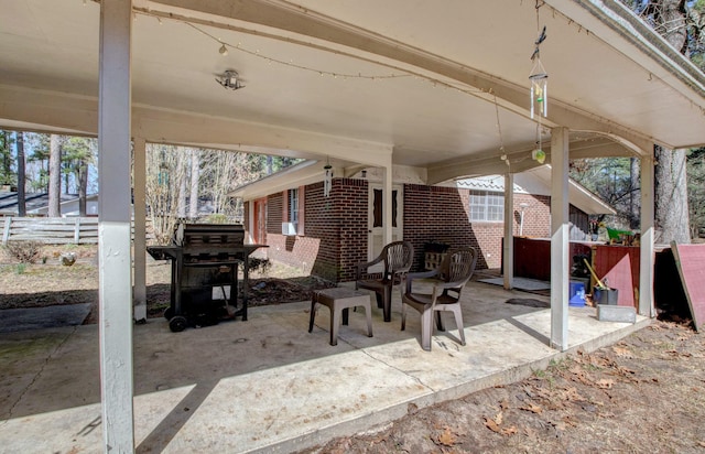 106 Pine Forest Ln, Fordyce, AR 71742 - view of patio featuring area for grilling and fence