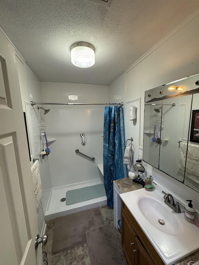 700 Thompson St, Mcgehee, AR 71654 - full bathroom with a shower with curtain, vanity, and a textured ceiling