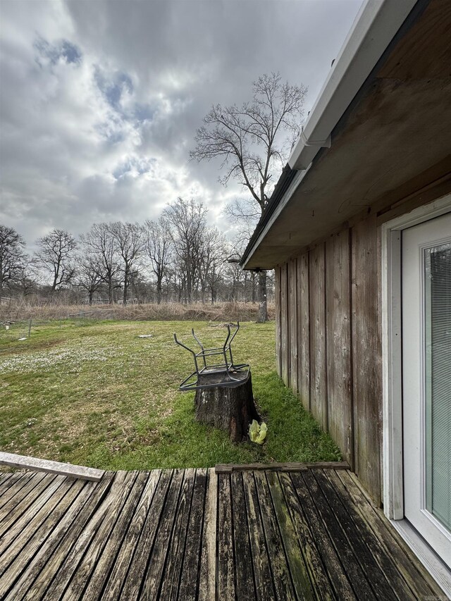 700 Thompson St, Mcgehee, AR 71654 - wooden terrace with a lawn