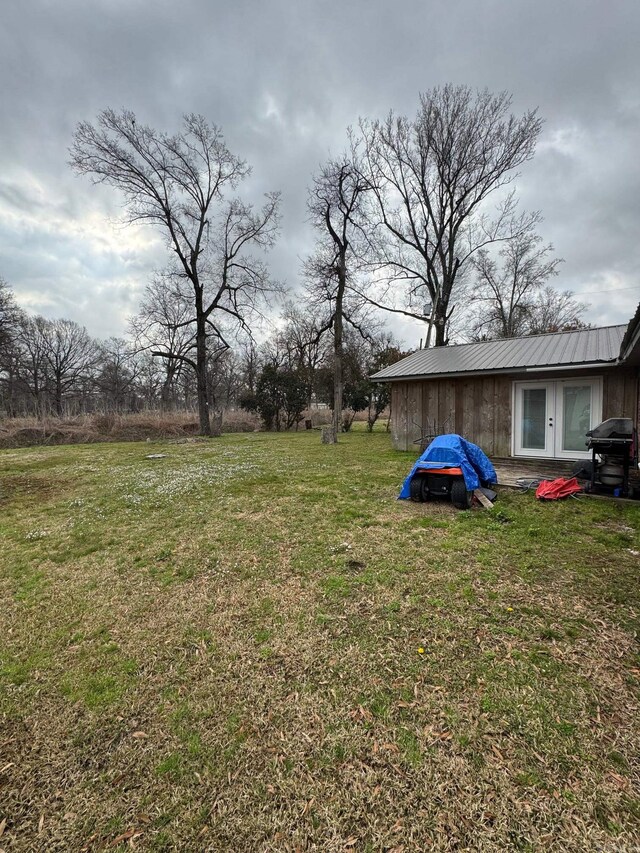700 Thompson St, Mcgehee, AR 71654 - view of yard featuring french doors