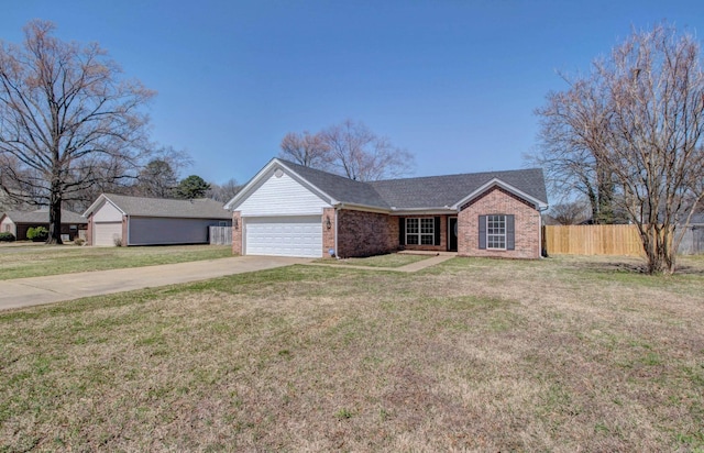 single story home with brick siding, a front lawn, fence, concrete driveway, and a garage