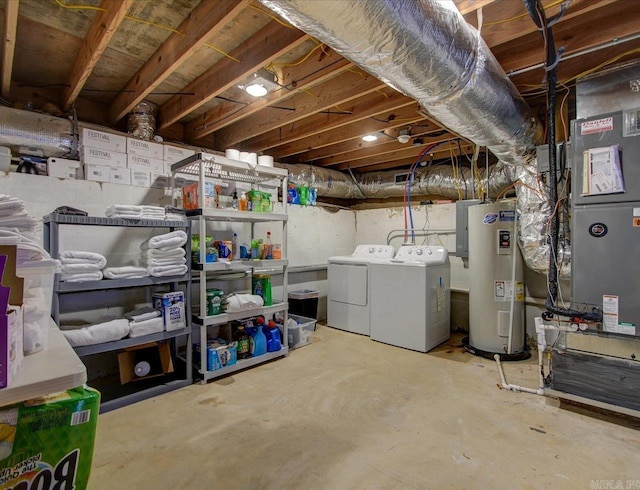 unfinished basement featuring heating unit, washer and dryer, and electric water heater