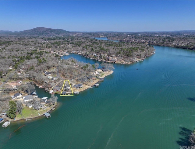 bird's eye view featuring a water and mountain view
