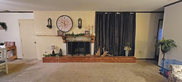 carpeted living area with ornamental molding and a fireplace