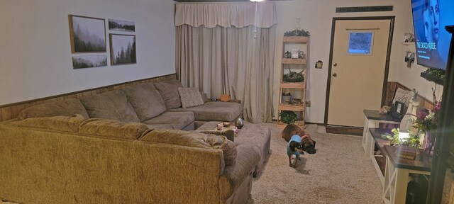 living room featuring carpet