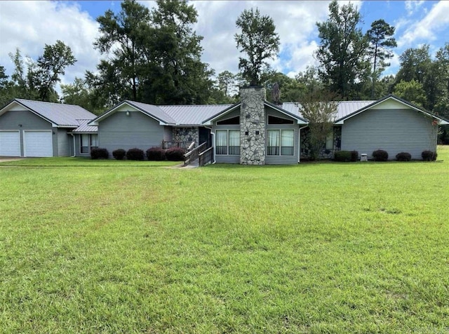 240 Timberlane Dr, Magnolia, AR 71753 - ranch-style house with a front yard, a chimney, a garage, and metal roof