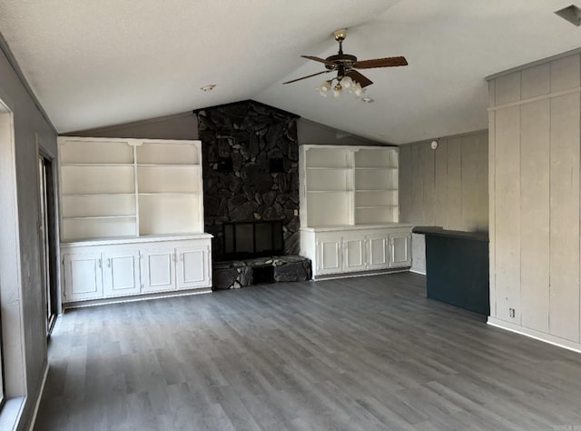 240 Timberlane Dr, Magnolia, AR 71753 - unfurnished living room featuring lofted ceiling, ceiling fan, and wood finished floors