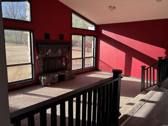 240 Timberlane Dr, Magnolia, AR 71753 - interior space with carpet floors, high vaulted ceiling, and a fireplace
