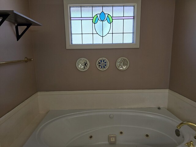 bathroom featuring a whirlpool tub