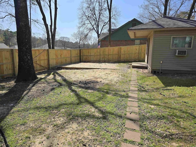 view of yard featuring a fenced backyard