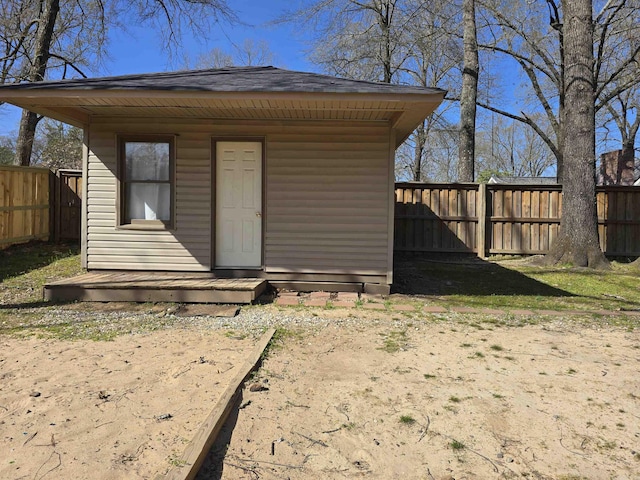 view of outbuilding with an outbuilding and a fenced backyard