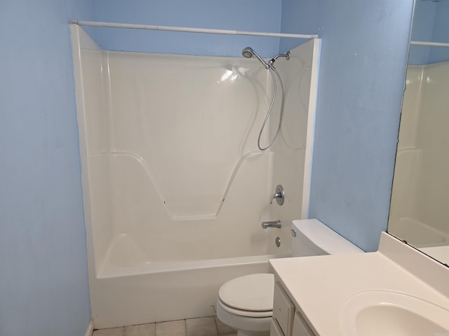 bathroom with toilet,  shower combination, vanity, and tile patterned flooring