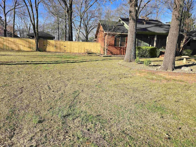view of yard featuring fence
