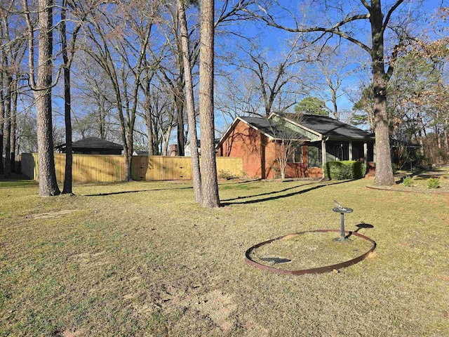 view of yard featuring fence