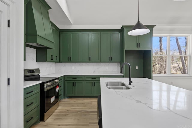 13505 Alexander Rd, Alexander, AR 72002 - kitchen featuring green cabinetry, tasteful backsplash, stainless steel range with electric stovetop, and a sink