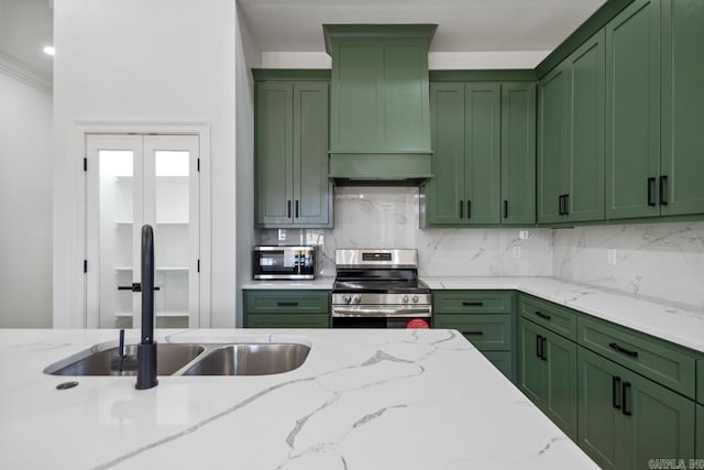 13505 Alexander Rd, Alexander, AR 72002 - kitchen with green cabinetry and stainless steel appliances
