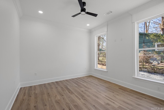 13505 Alexander Rd, Alexander, AR 72002 - spare room featuring visible vents, crown molding, baseboards, ceiling fan, and wood finished floors