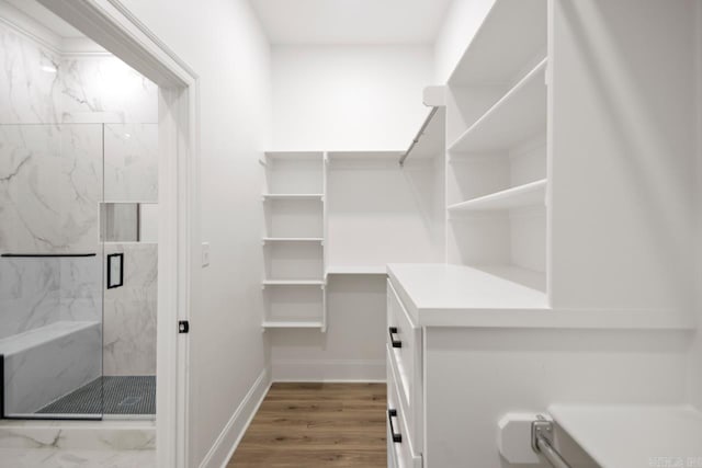 13505 Alexander Rd, Alexander, AR 72002 - walk in closet featuring wood finished floors
