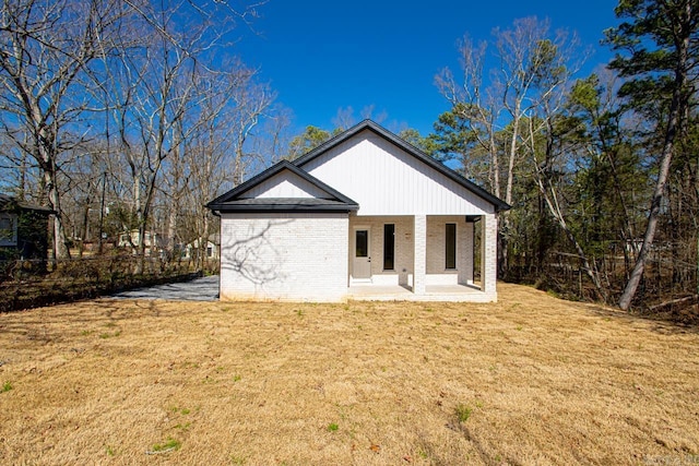 13505 Alexander Rd, Alexander, AR 72002 - back of property with a lawn and brick siding