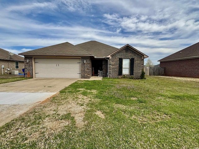 single story home featuring central air condition unit, an attached garage, brick siding, and driveway