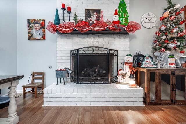 2304 Forrest Park Dr, Arkadelphia, AR 71923 - living area featuring wood finished floors and a fireplace