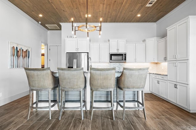 1601 Marion Anderson Rd, Hot Springs, AR 71913 - kitchen featuring tasteful backsplash, wood ceiling, visible vents, and stainless steel appliances