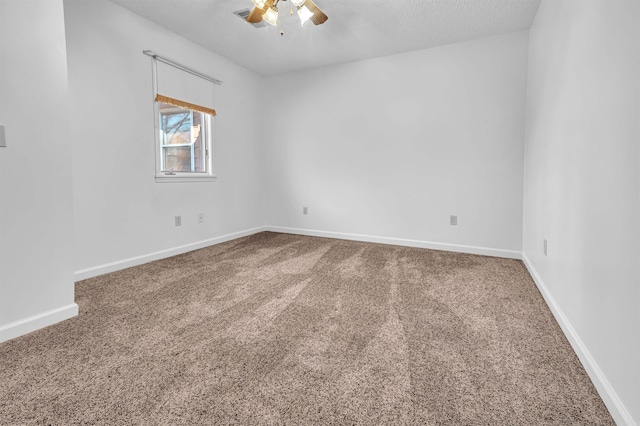 120 Lisa Blvd, Greers Ferry, AR 72067 - carpeted spare room with baseboards, a textured ceiling, and a ceiling fan
