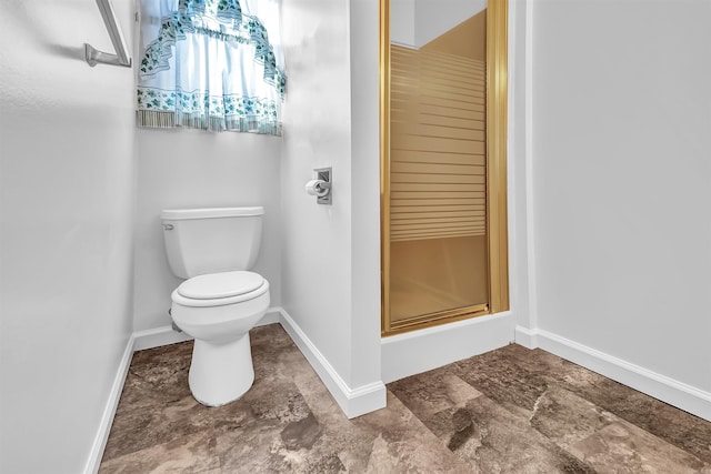 120 Lisa Blvd, Greers Ferry, AR 72067 - full bathroom with toilet, baseboards, a shower with door, and stone finish flooring